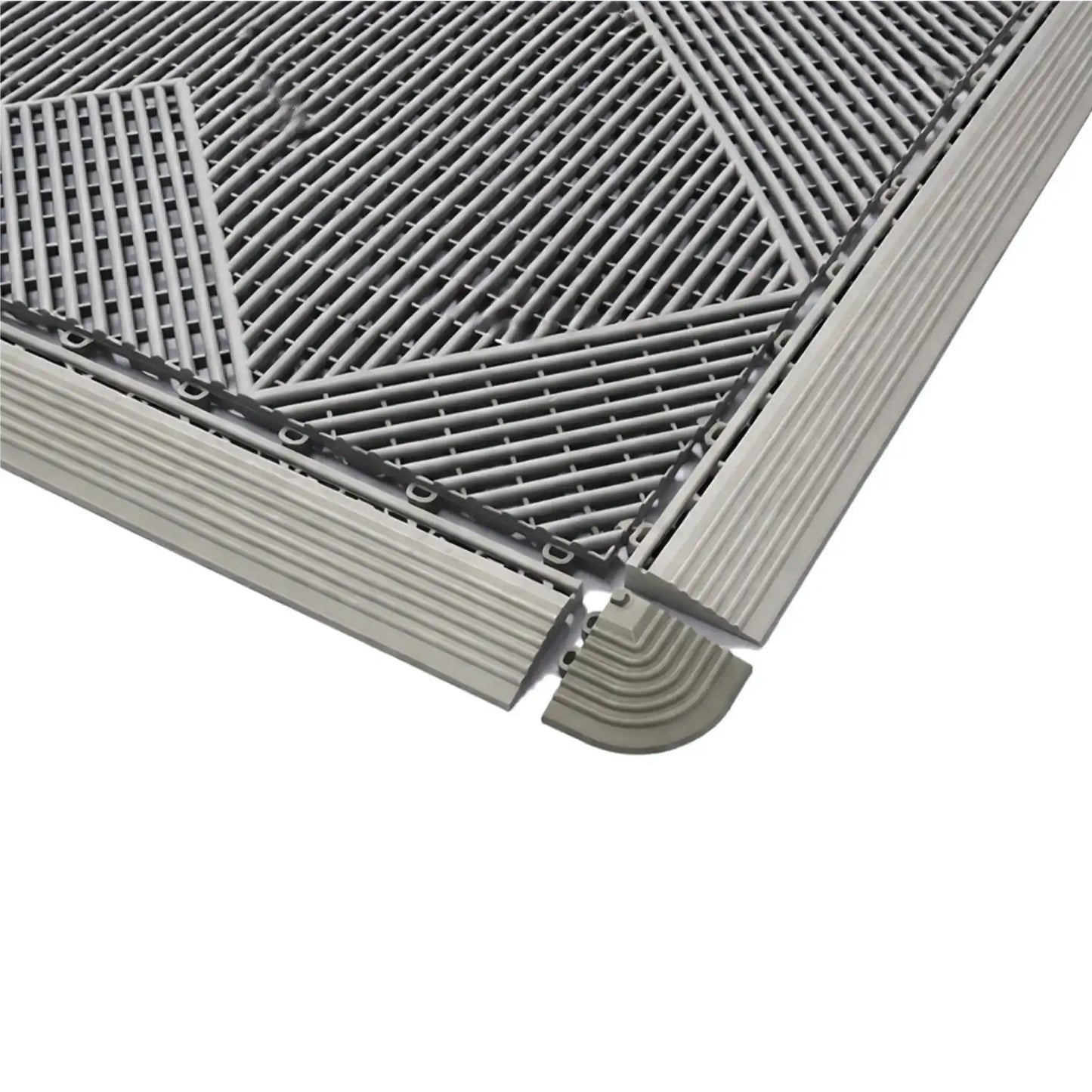Détail des bordures et angles de finition pour dalles drainantes antidérapantes facilitant l’accès et la sécurité.
