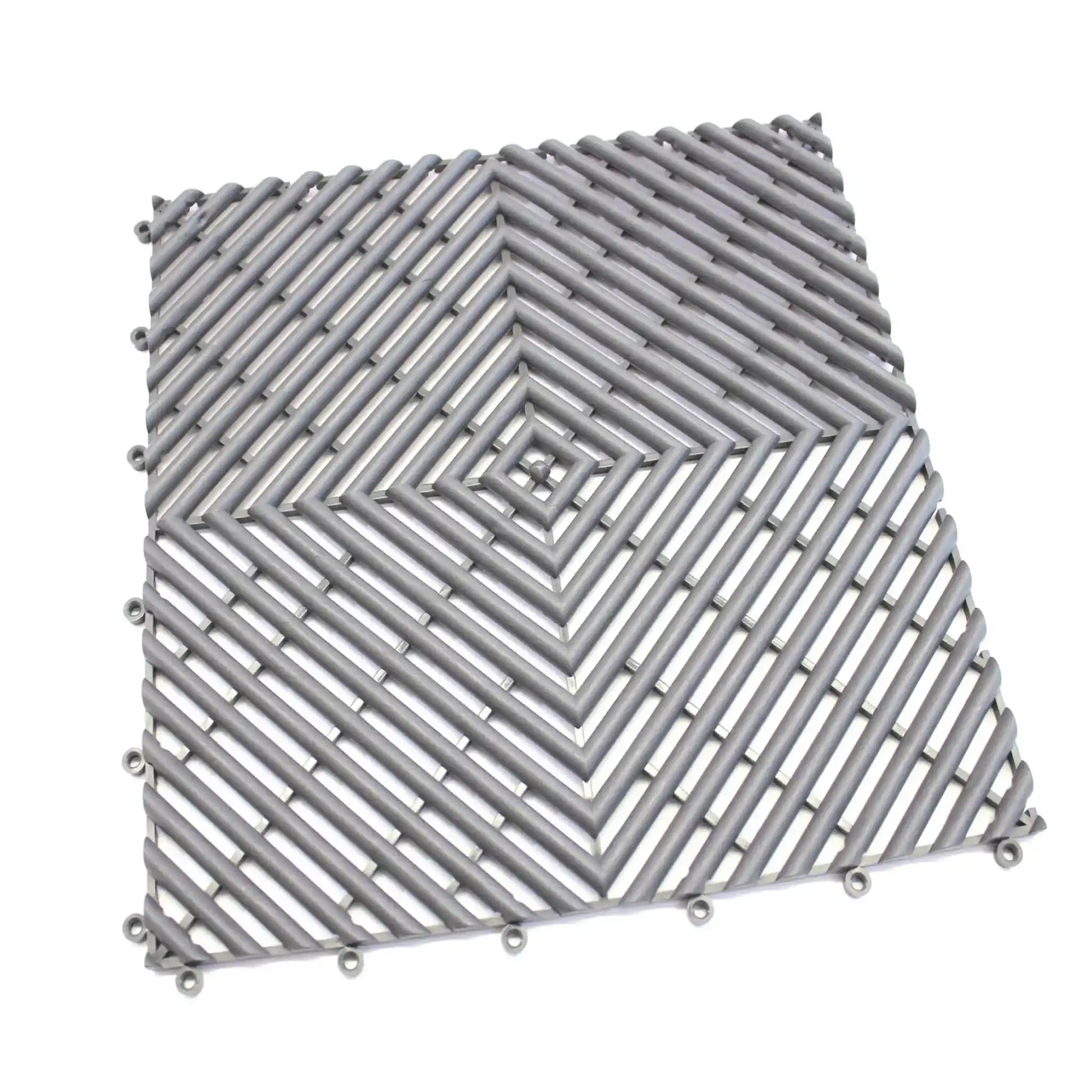 Dalle drainante antidérapante grise modulable conçue pour améliorer l’adhérence et le drainage dans les environnements humides.
