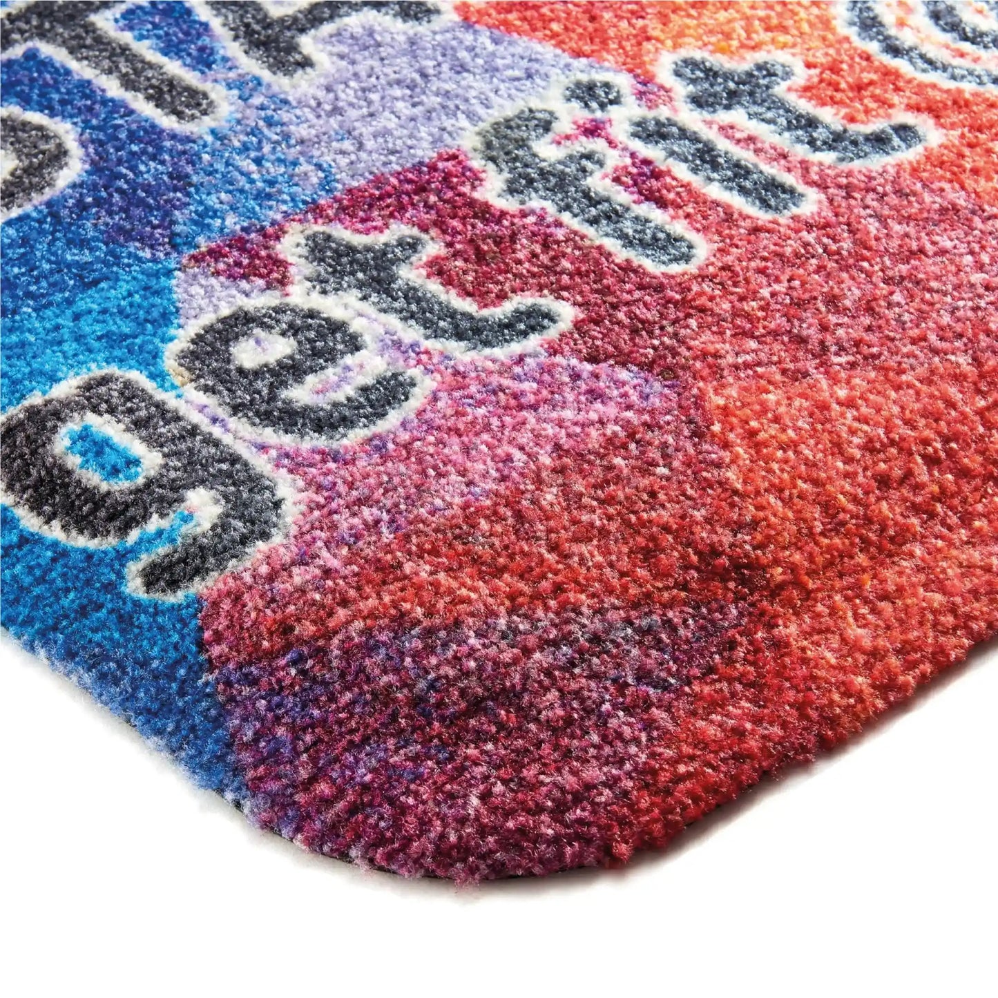 Gros plan sur la surface imprimée d’un tapis logo personnalisé anti-fatigue avec finition haute définition et texture confortable.