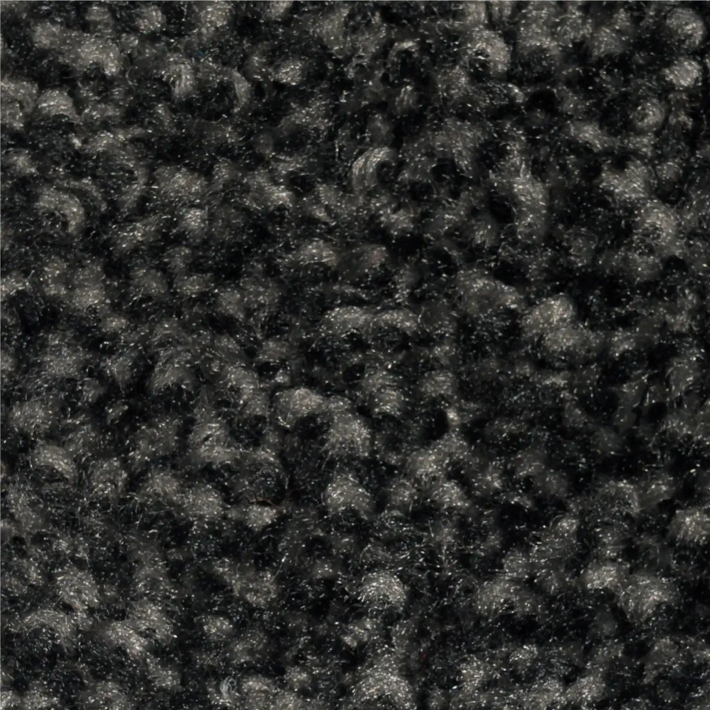 Zoom sur les fibres haute densité d’un tapis d’entrée écologique conçu pour un usage professionnel intensif et durable.