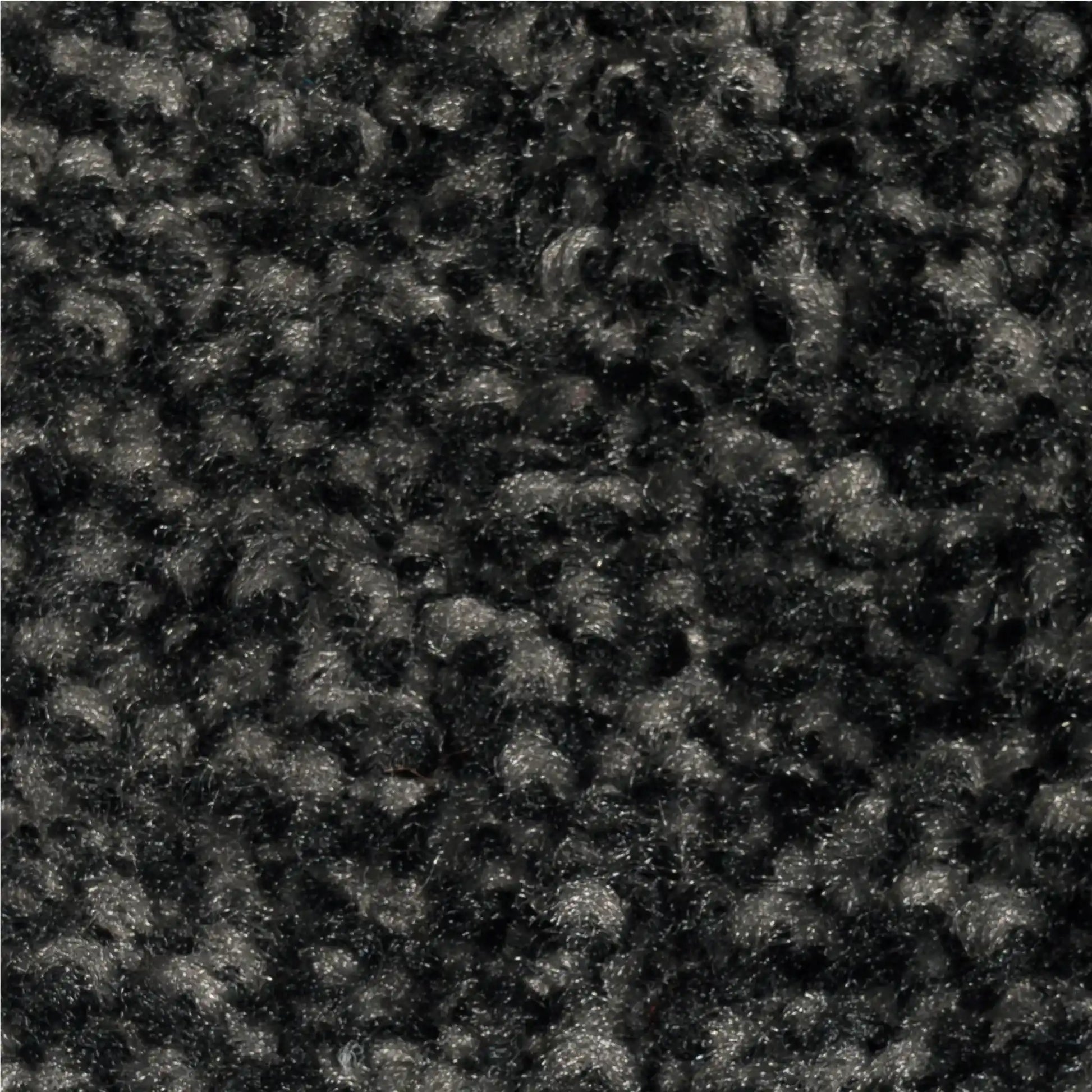 Zoom sur les fibres haute densité d’un tapis d’entrée écologique conçu pour un usage professionnel intensif et durable.