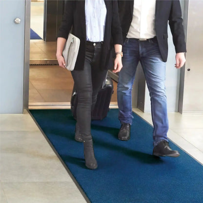 Tapis d’entrée professionnel couleur unie bleu pour zones de passage dans les bureaux et espaces professionnels.